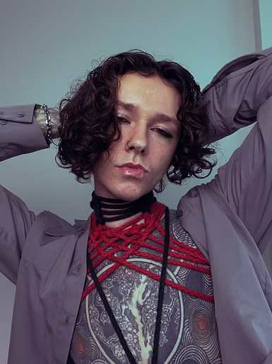 Male model with shibari neck tie