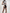Male model lifting up his dress